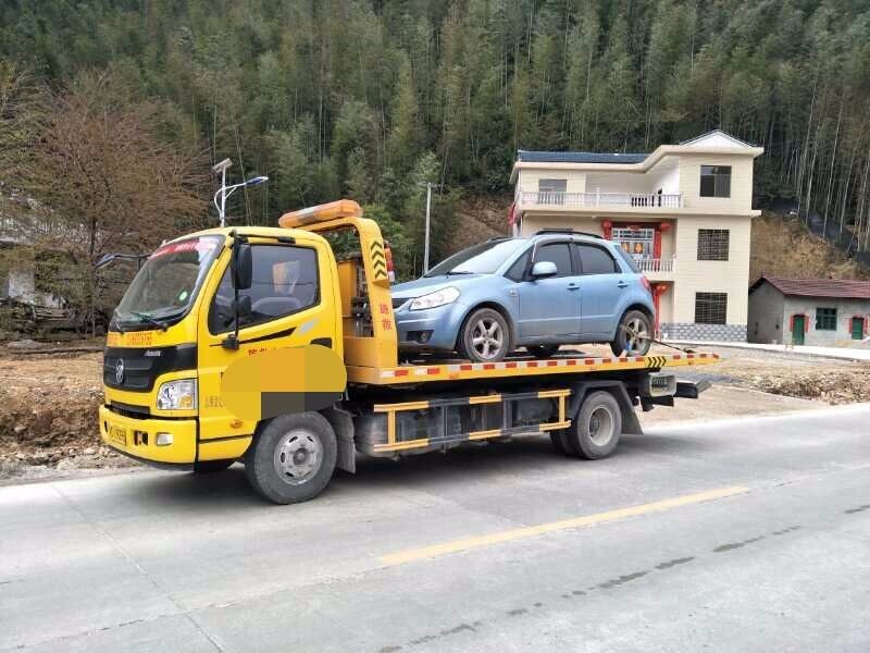 海口专业汽车道路救援电话海口拖车海口搭电海口脱困换胎